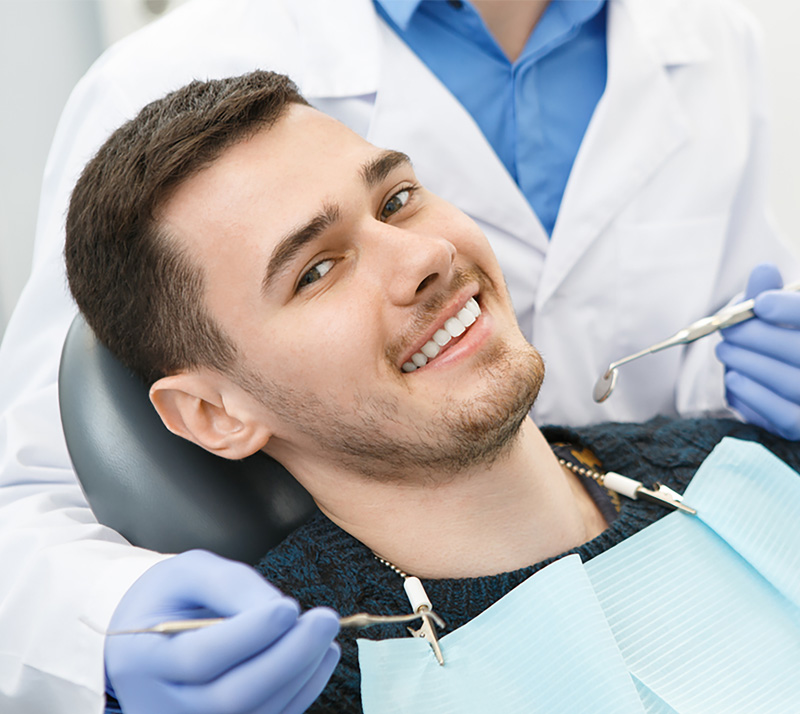 man getting dental crown at nearest dental clinic